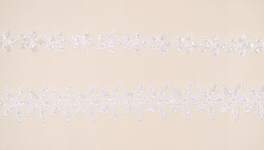 Nastri fiori con piccole paillettes