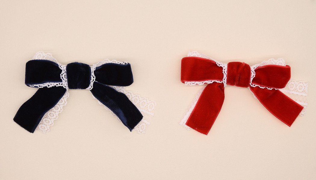 FIOCCO CON CODE IN VELLUTO E PIZZO