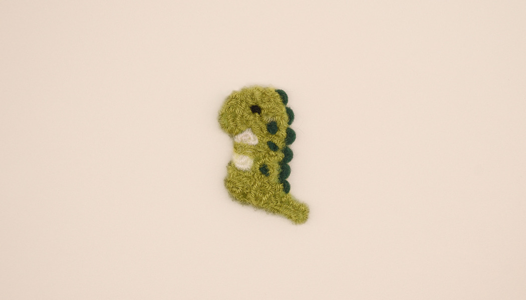 DINOSAURO 3D TESSUTO RICCIOLO 