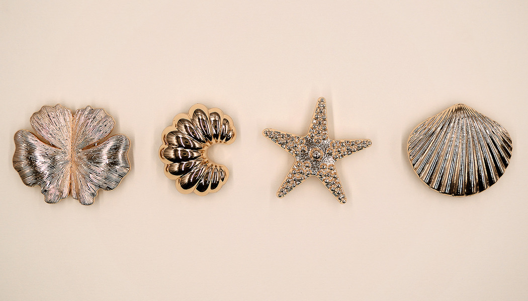 ACCESSORI METALLICI CON PASSANTE SUL RETRO 